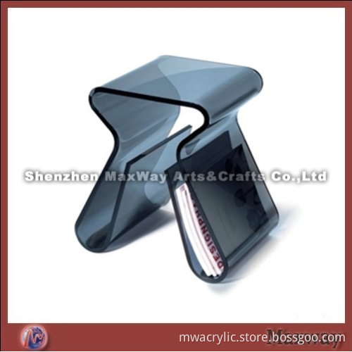 Black acrylic/perspex coffee table with magazine holder